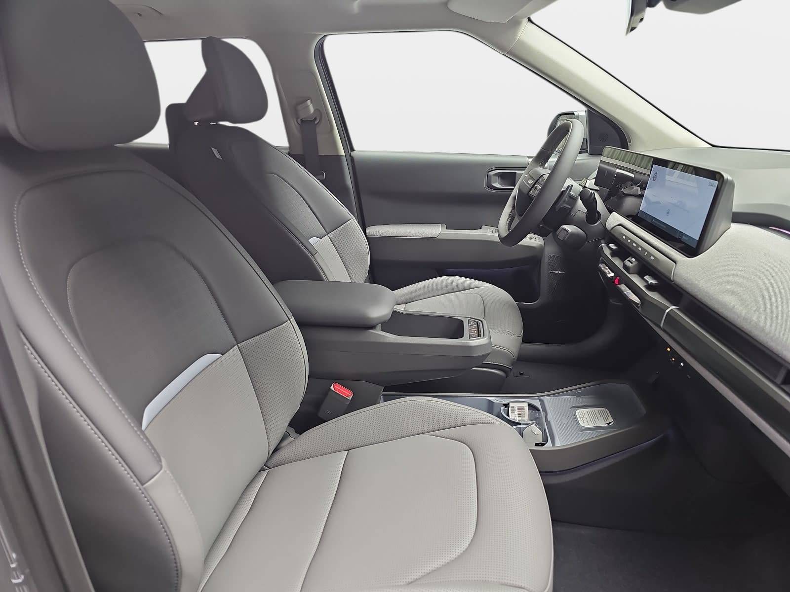 KIA EV3 81.4 KWH EARTH MJ26 WINTER BUSIN. UPGRADE DRIVEWISE-PARK DESIGN SOUND